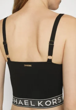 MICHAEL Michael Kors Eco KorsTopBlack Donna T-shirt E Top MK121I05X-Q11 -Vendite Next 1d96e1fc161e4038b7378897eed75967 scaled