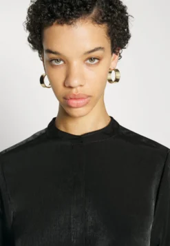 DKNY Baloon Sleeves ShirtCamicettaBlack Donna Camicie E Bluse DK121E05B-Q11 -Vendite Next 4f95bf7a034e4b7bb1690ad221b2899d scaled