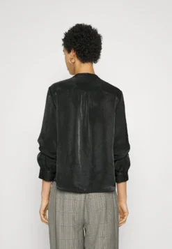 DKNY Baloon Sleeves ShirtCamicettaBlack Donna Camicie E Bluse DK121E05B-Q11 -Vendite Next 95b4745157124b2a9a8acbe38af34083 scaled